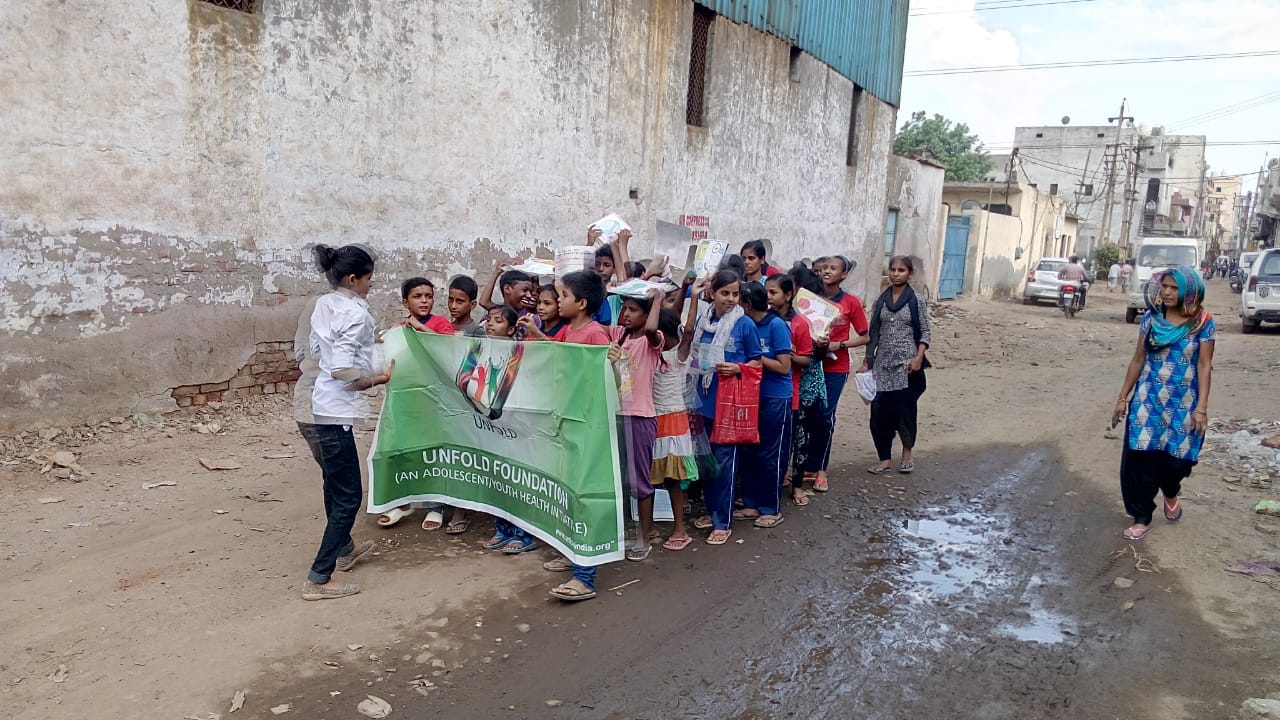 CONTINUING AWARENESS DRIVE IN NEIGHBOURING SLUMS ON ENVIRONMENT ISSUES